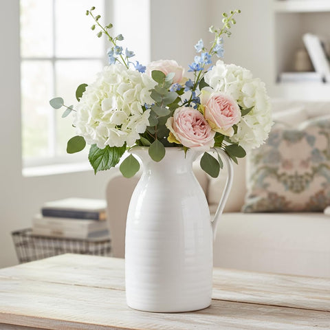 Hjn white ceramic vase on kitchen counter complements decor