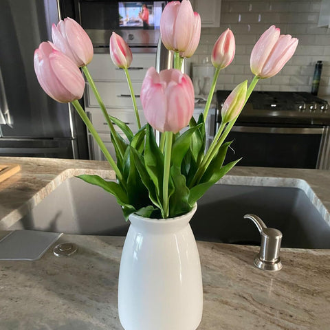 HJN white vase mantel decor adds height and texture to shelves.