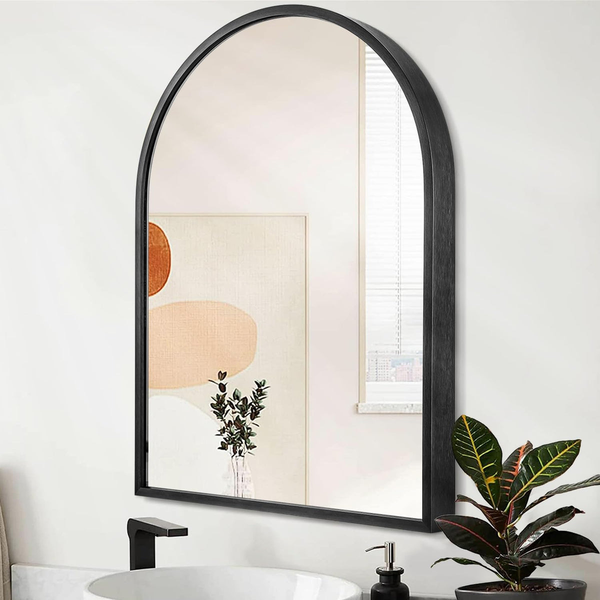 HLFMVWE arch wall mirror with a black brushed metal frame for versatile spaces