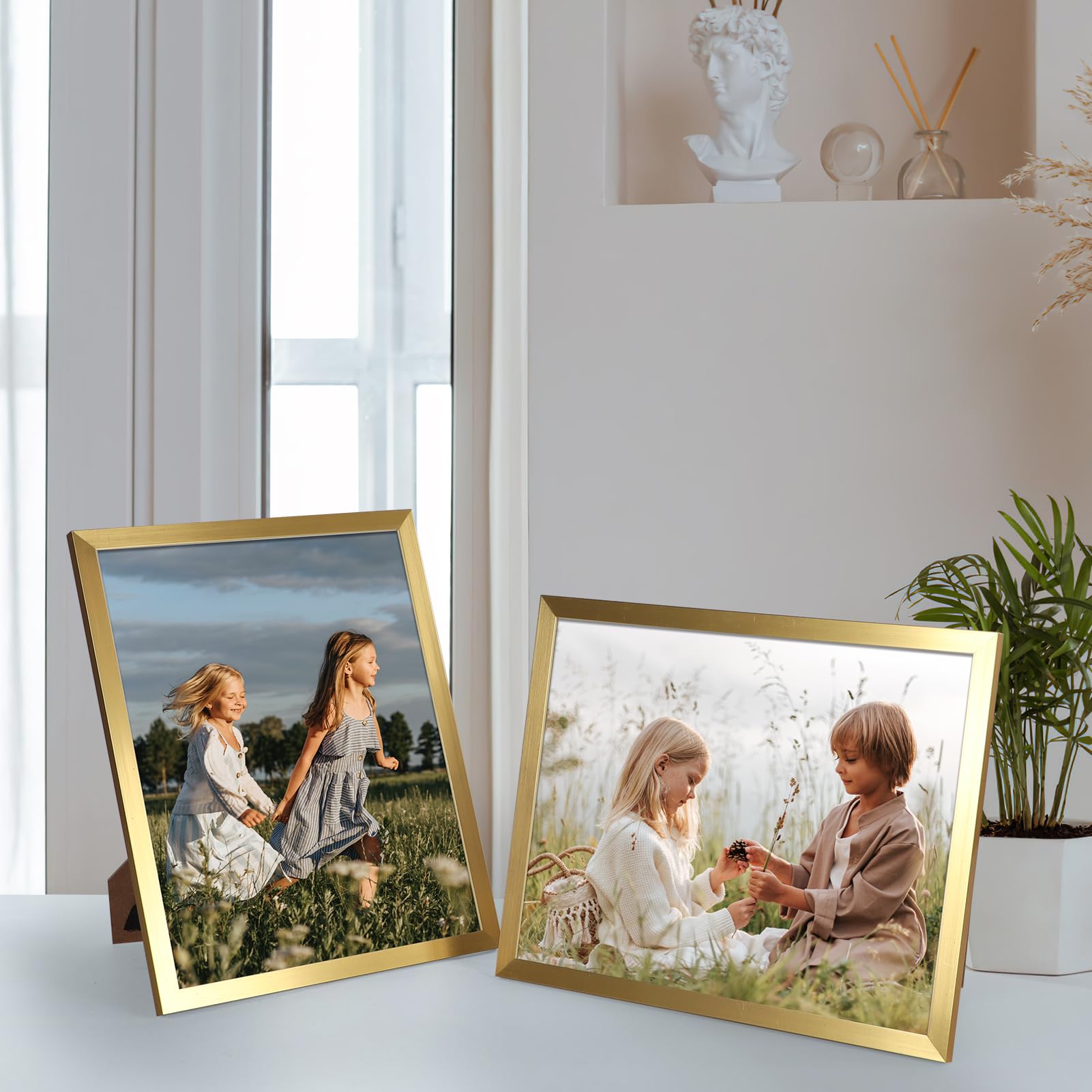 Hoikwo frames create a warm family photo gallery on a wall.