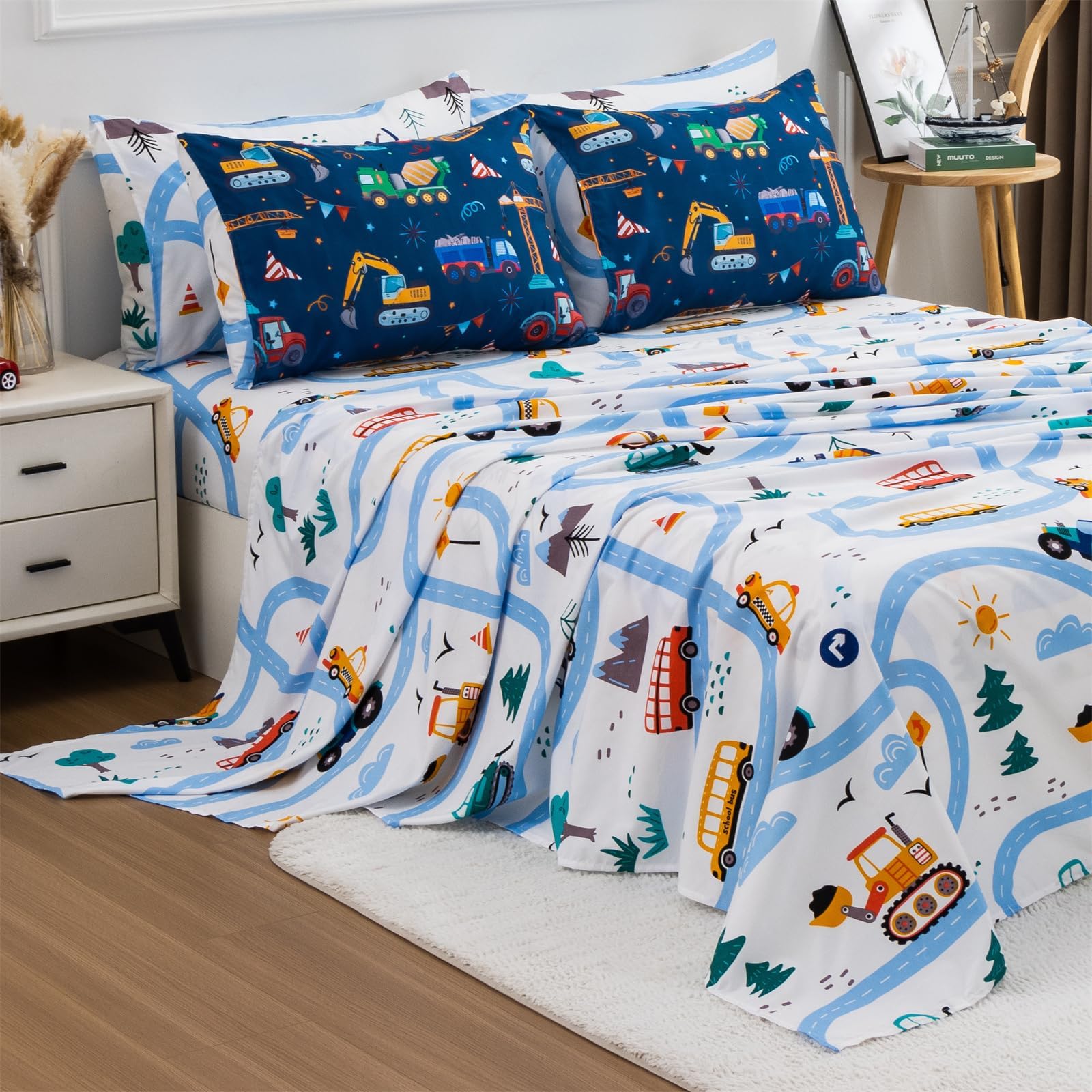 Holawakaka flat sheet with construction pattern complements playful decor.