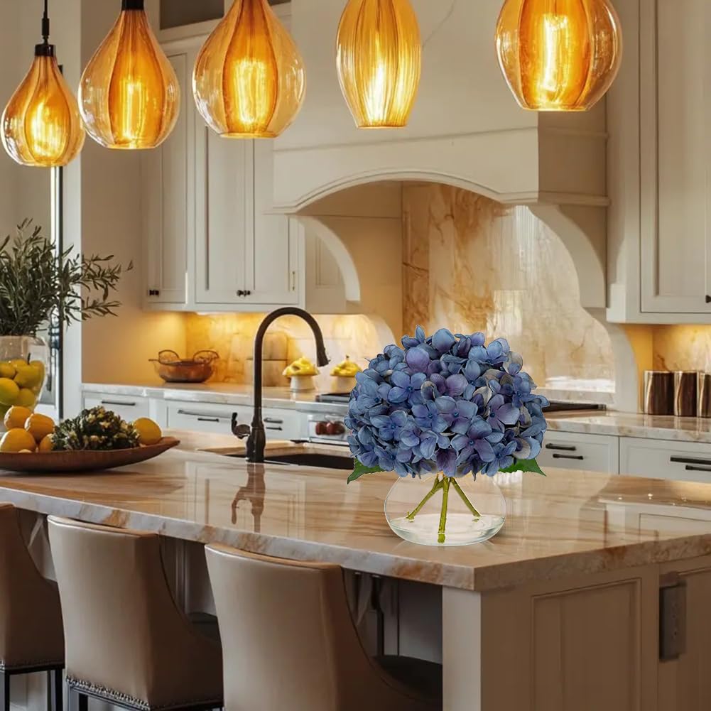 Hollyone glass vase with faux water creates a polished display.