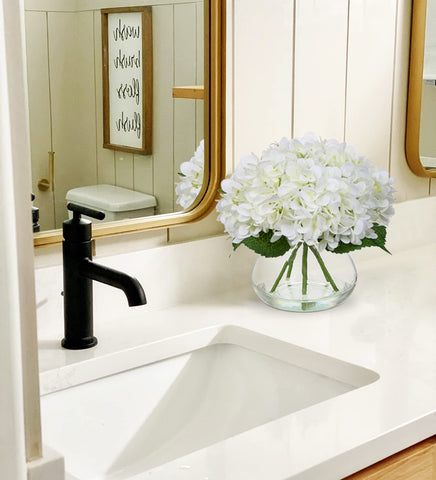 Hollyone hydrangea on an office desk adds warmth to workspaces
