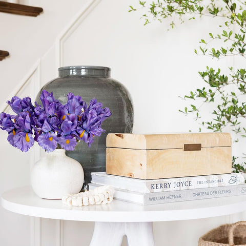 Hollyone handmade iris flowers create realistic layering for wedding arches and tables.