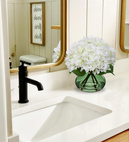 Hollyone silk hydrangea bouquet provides year-round color without daily upkeep.