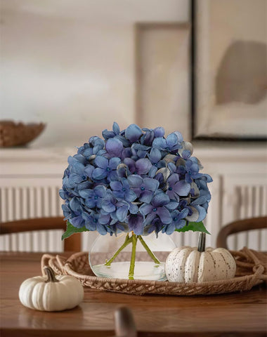 Hollyone table centerpiece for fall decor adds warm ambiance.