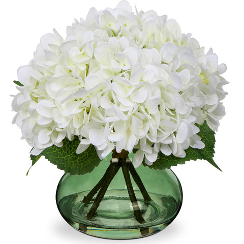 Hollyone White Hydrangeas in a glass vase add elegant, low-maintenance decor.