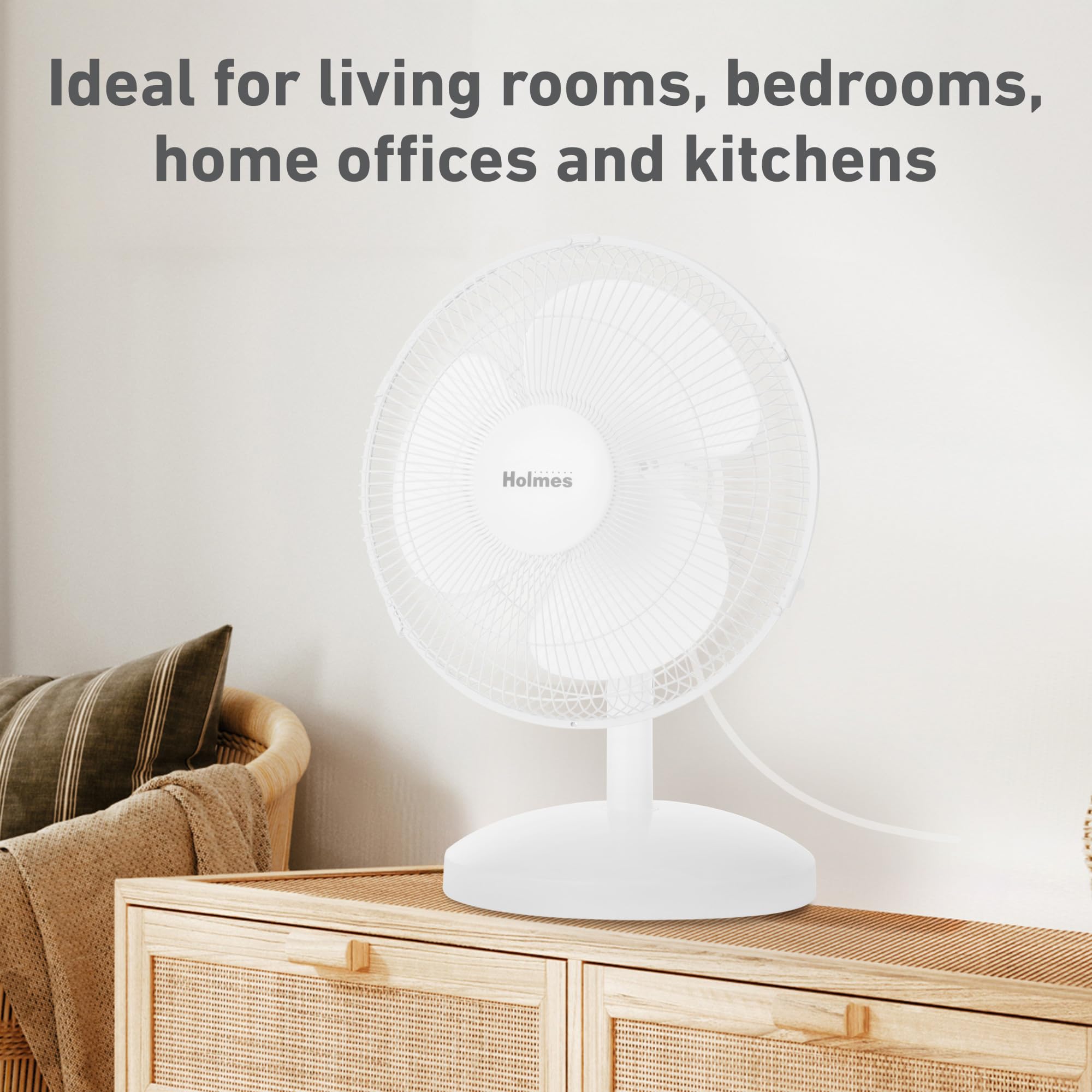 Holmes 75-degree oscillating fan broadens airflow across a living room.