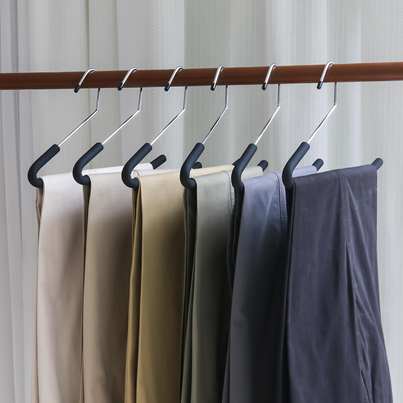 Homa Jia heavy-duty pants hanger holding jeans with secure grip