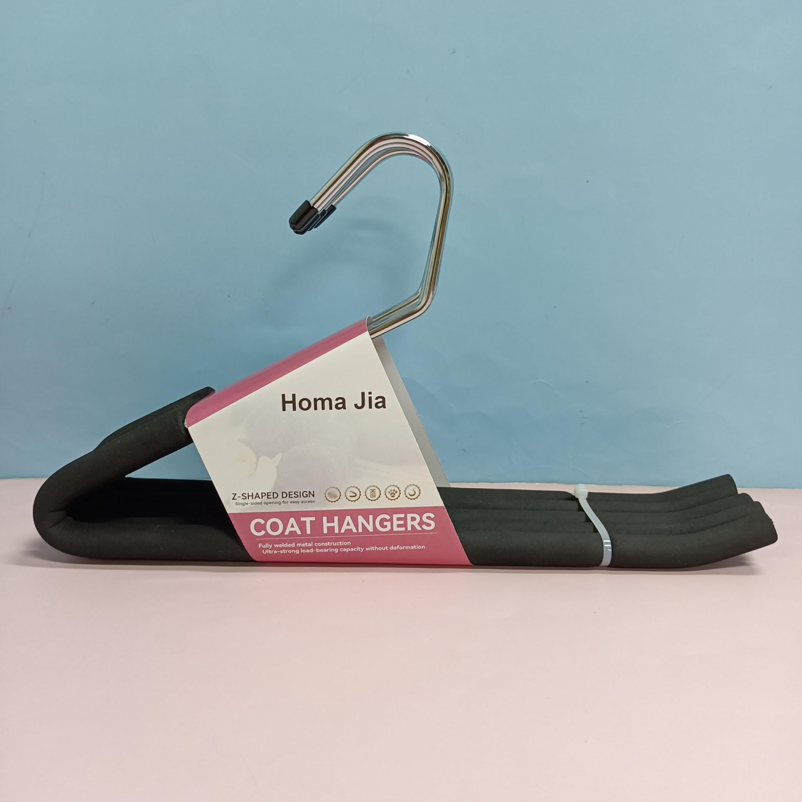 Homa Jia organized wardrobe with open-ended hangers ready for daily outfits