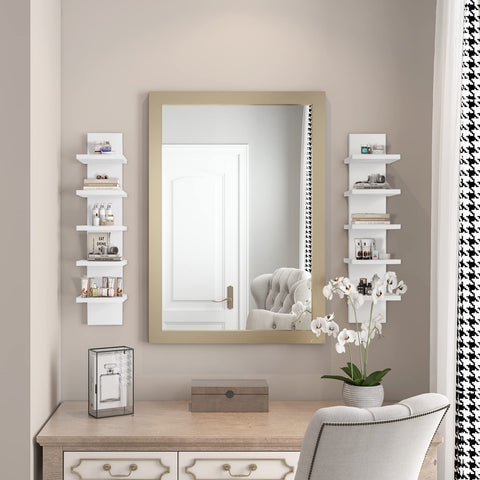 Narrow white wall shelf holding candles and cosmetics in a tidy nook