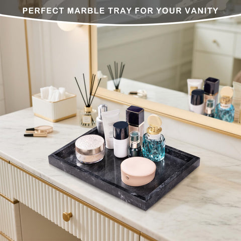 Homaura marble tray sits elegantly on a coffee table