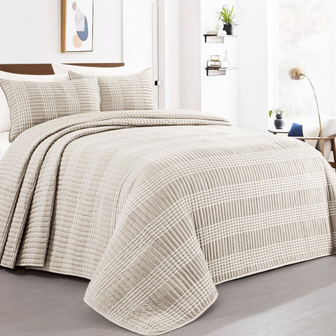 HOMBYS seersucker patchwork oversized quilt drapes floor-to-floor for a clean bed silhouette