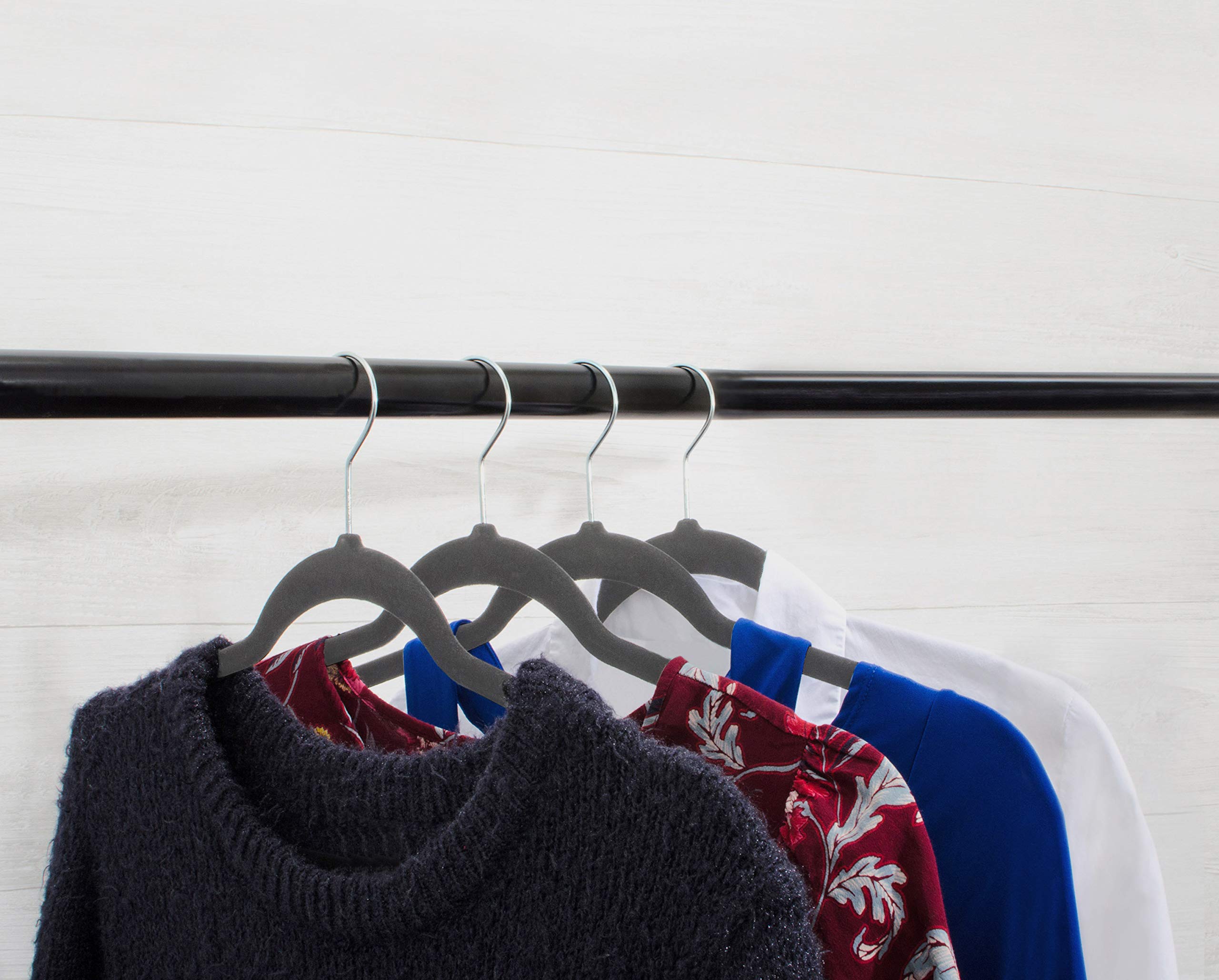 Home Expressions velvet non-slip hanger close-up highlights notched shoulders prevent slipping.
