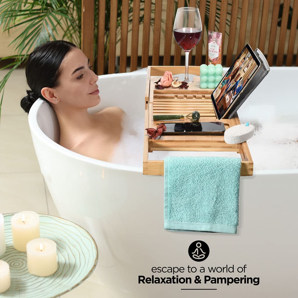 HOME IT expandable tray fits multiple tub sizes for a customizable bath setup.