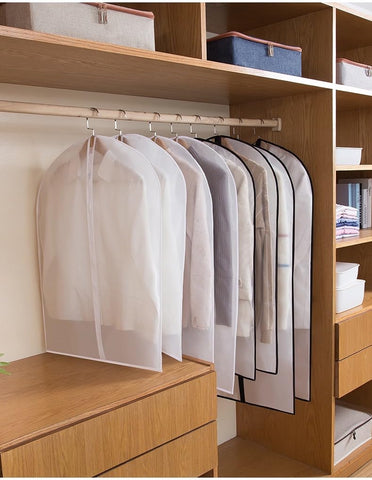 HomeClean garment bags organized in wardrobe for efficient storage
