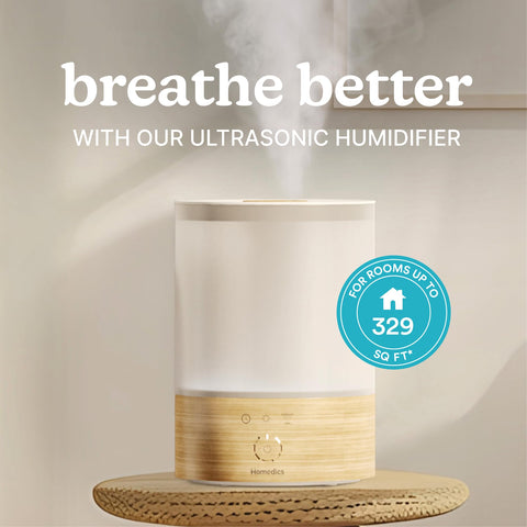 Homedics humidifier with 360-degree mist nozzle dispersing moisture evenly