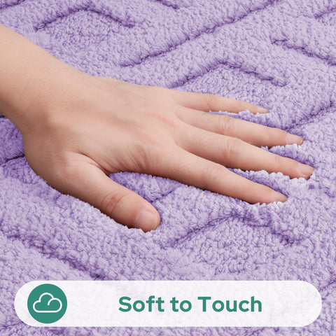 HOMEIDEAS bath rug texture closeup highlights ultra-soft shaggy fibers.