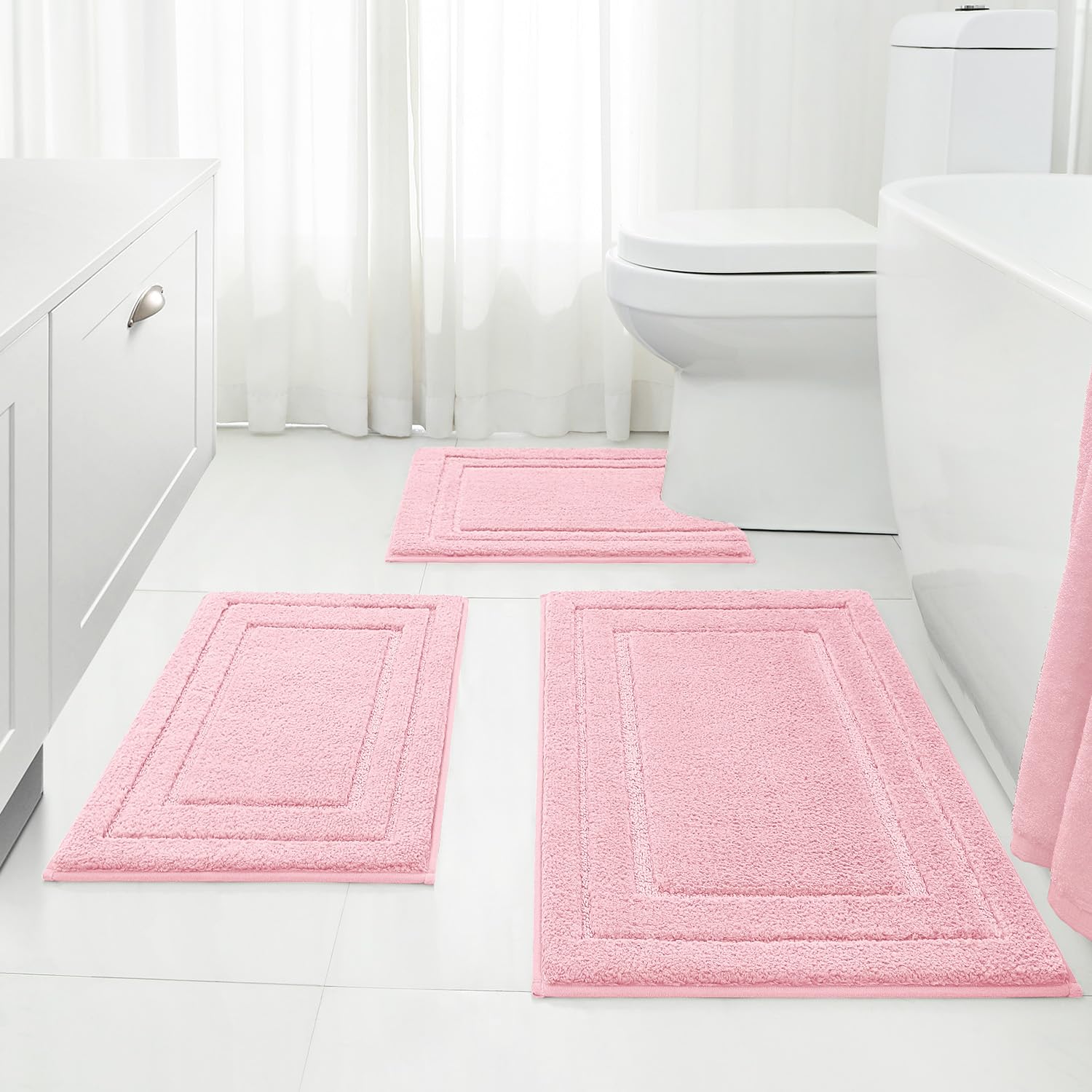 HOMEIDEAS light-pink 3-piece rug set enhances bathroom comfort with plush microfiber.