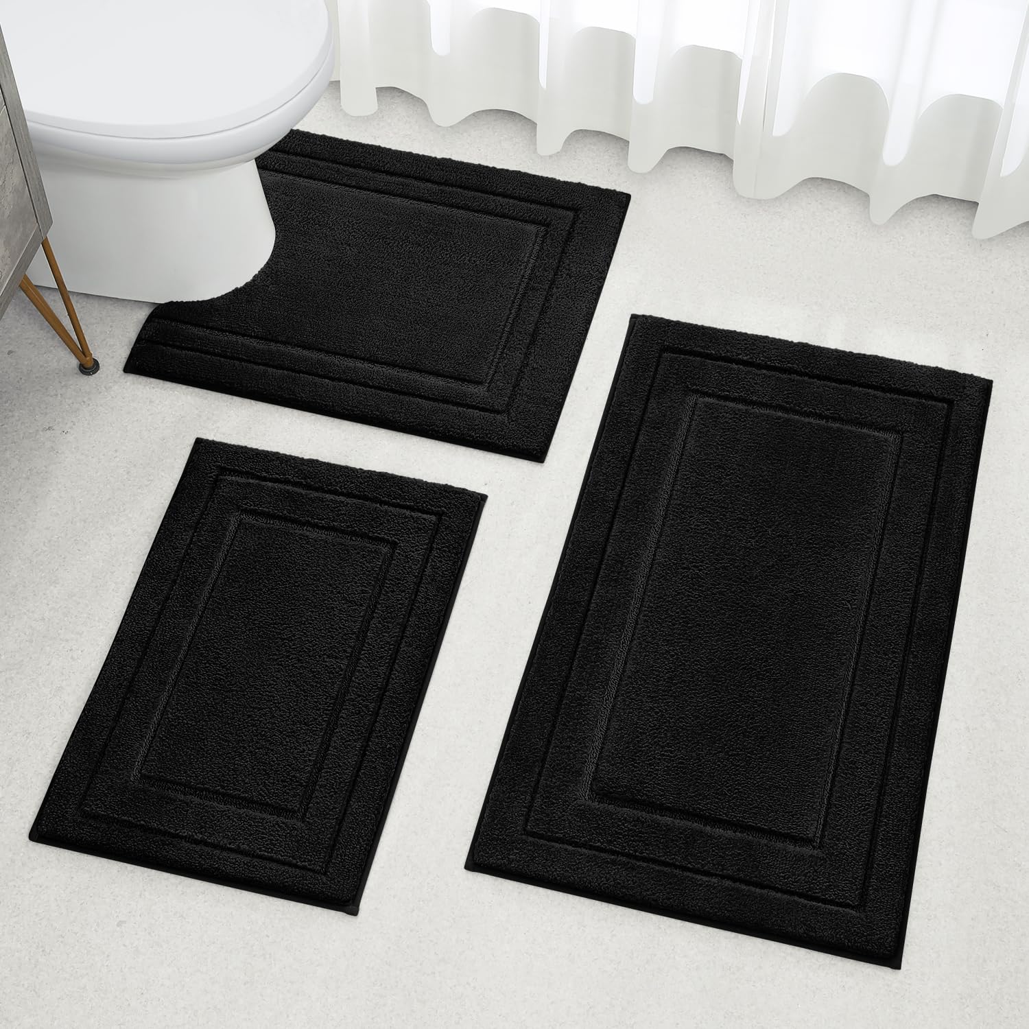 HOMEIDEAS black color coordinates with modern bathrooms for a cohesive look