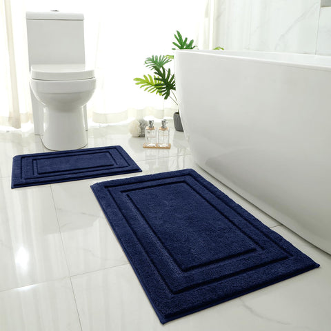 HOMEIDEAS 2-piece navy bathroom rug set provides soft comfort after showers.