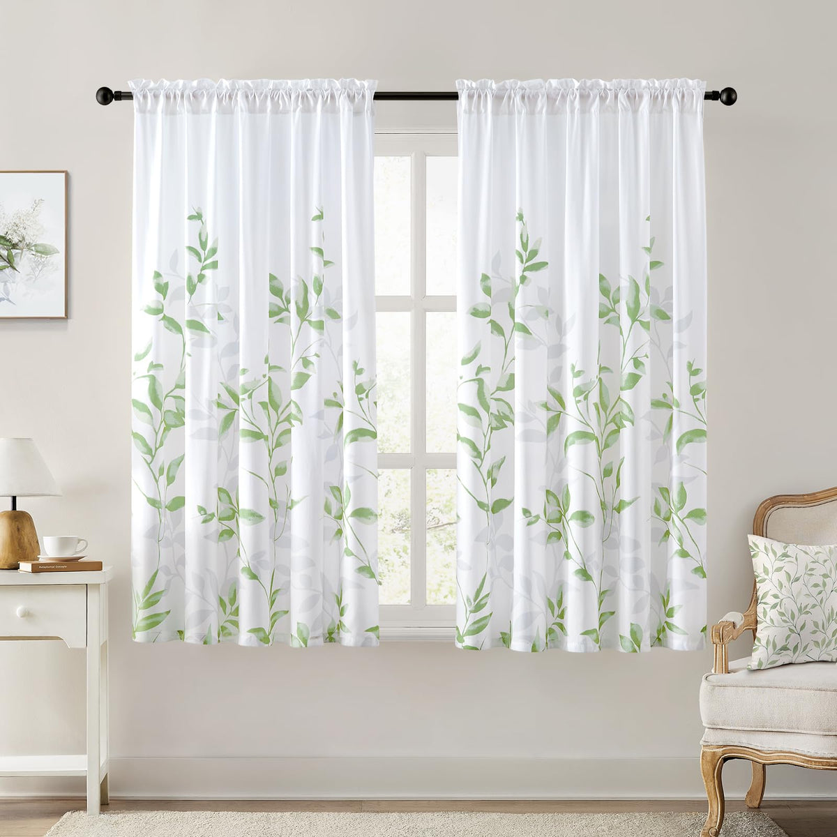 Homeideas leaf-print bottom semi-sheer curtain adds privacy with soft daylight.