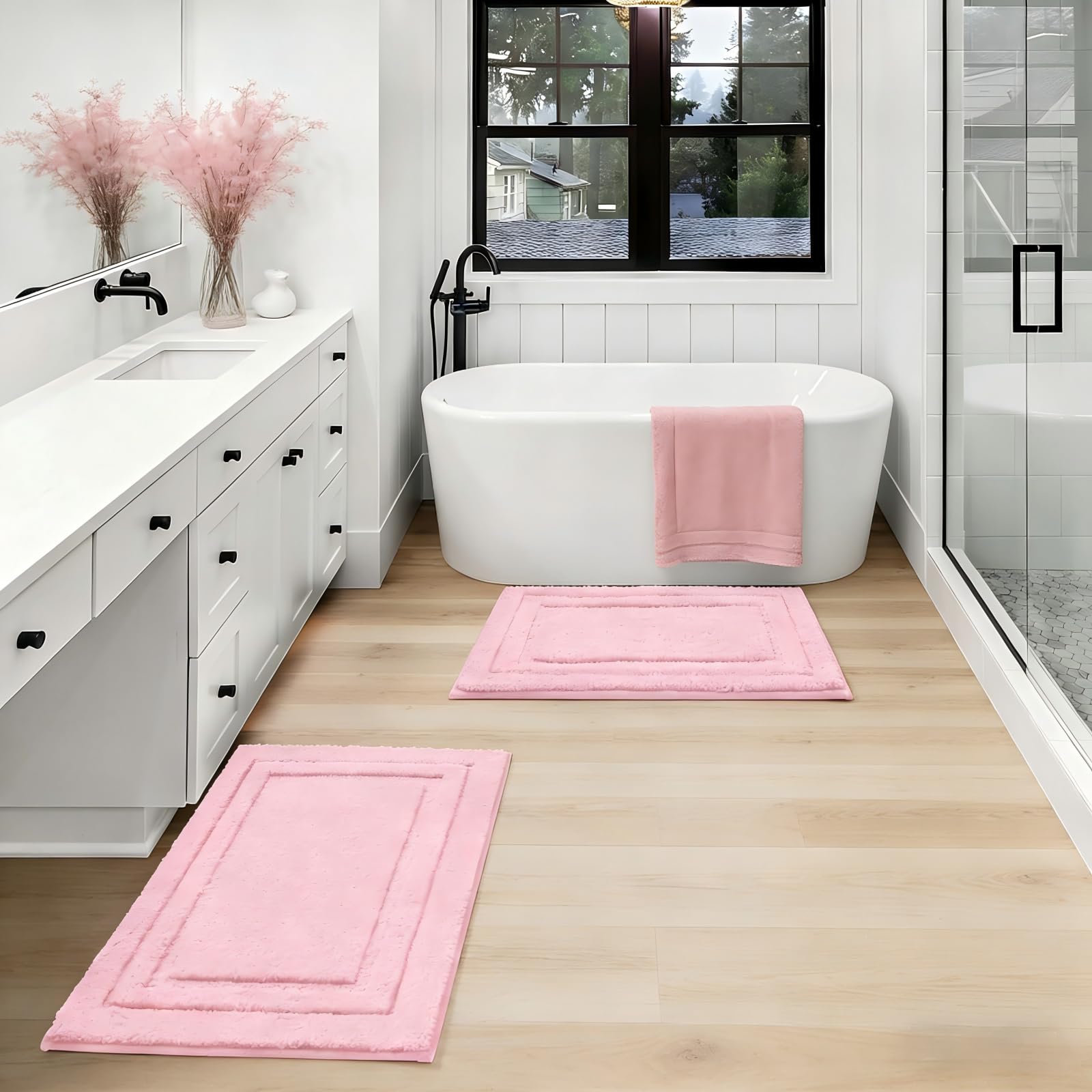 HOMEIDEAS pink bath rug close-up shows absorbent microfiber texture.