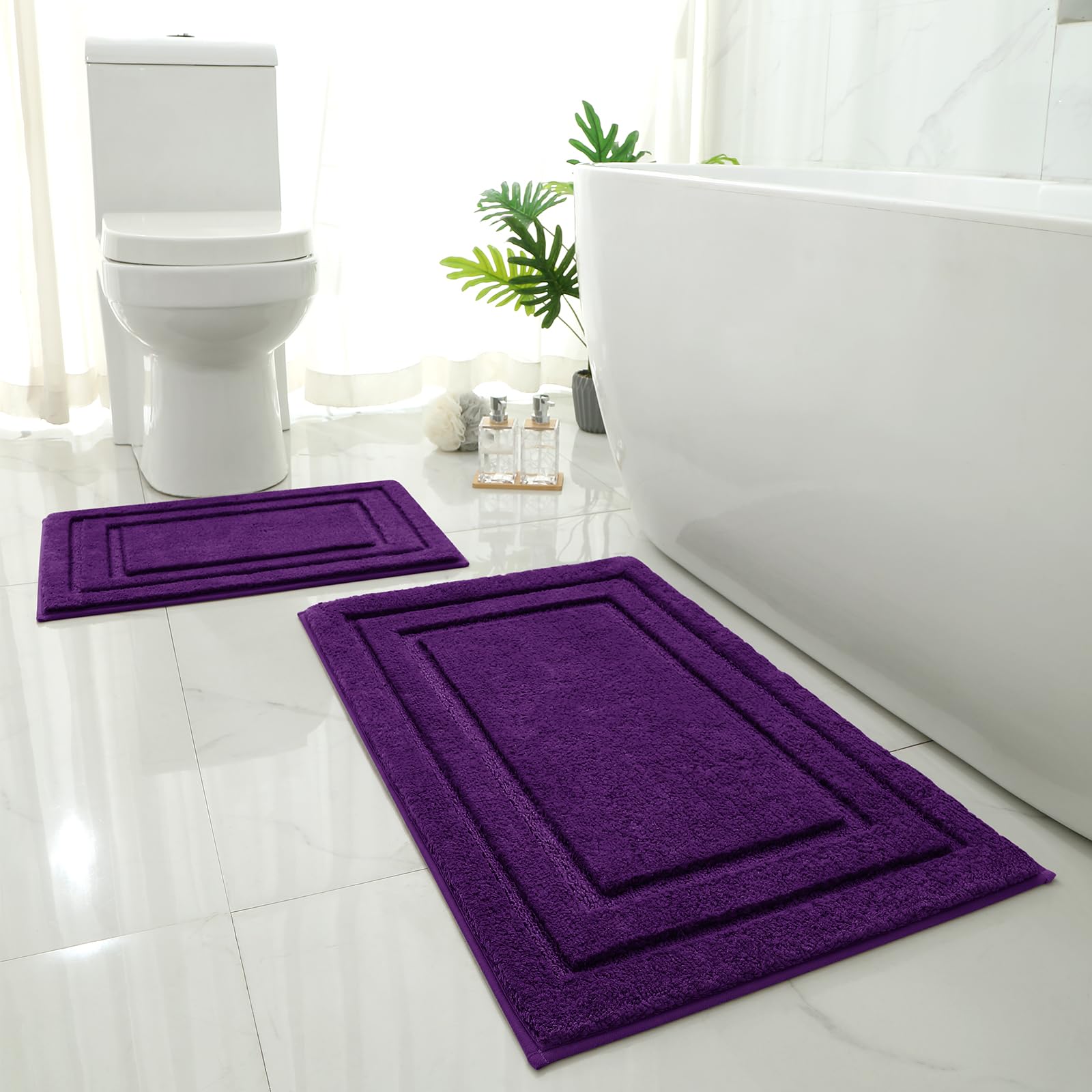 HOMEIDEAS Purple 2pc bath rug set adds plush comfort to your bathroom.