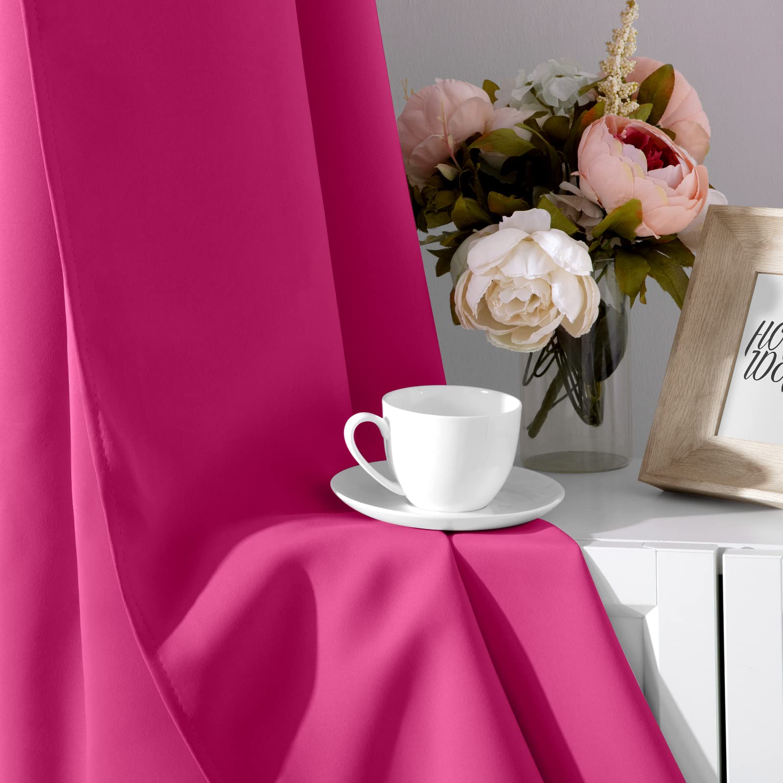 HOMEIDEAS Room-darkening curtains offer elegant drape and privacy for windows.