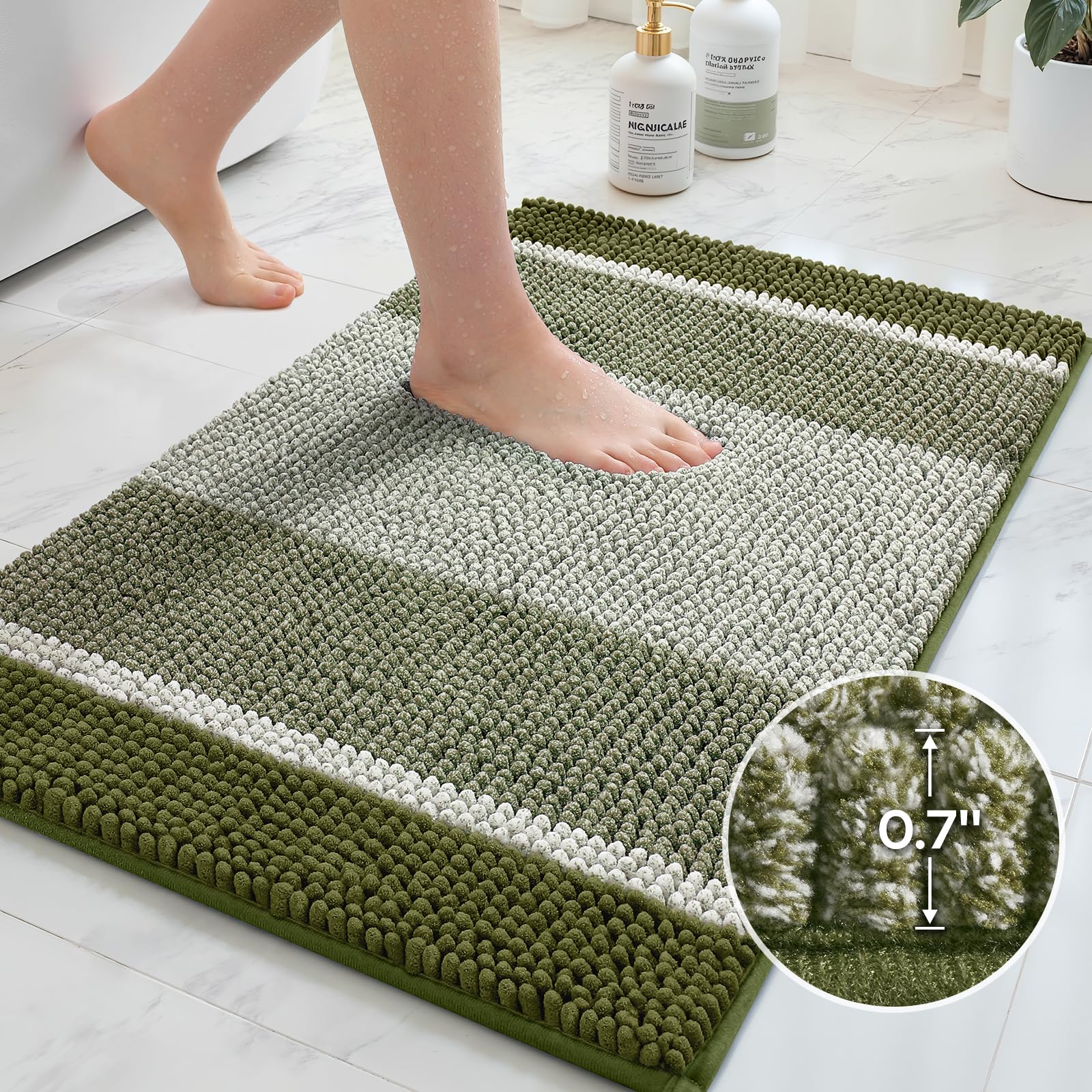 HOMEIDEAS Sage Green bath rug in bathroom scene adds cohesive green look.