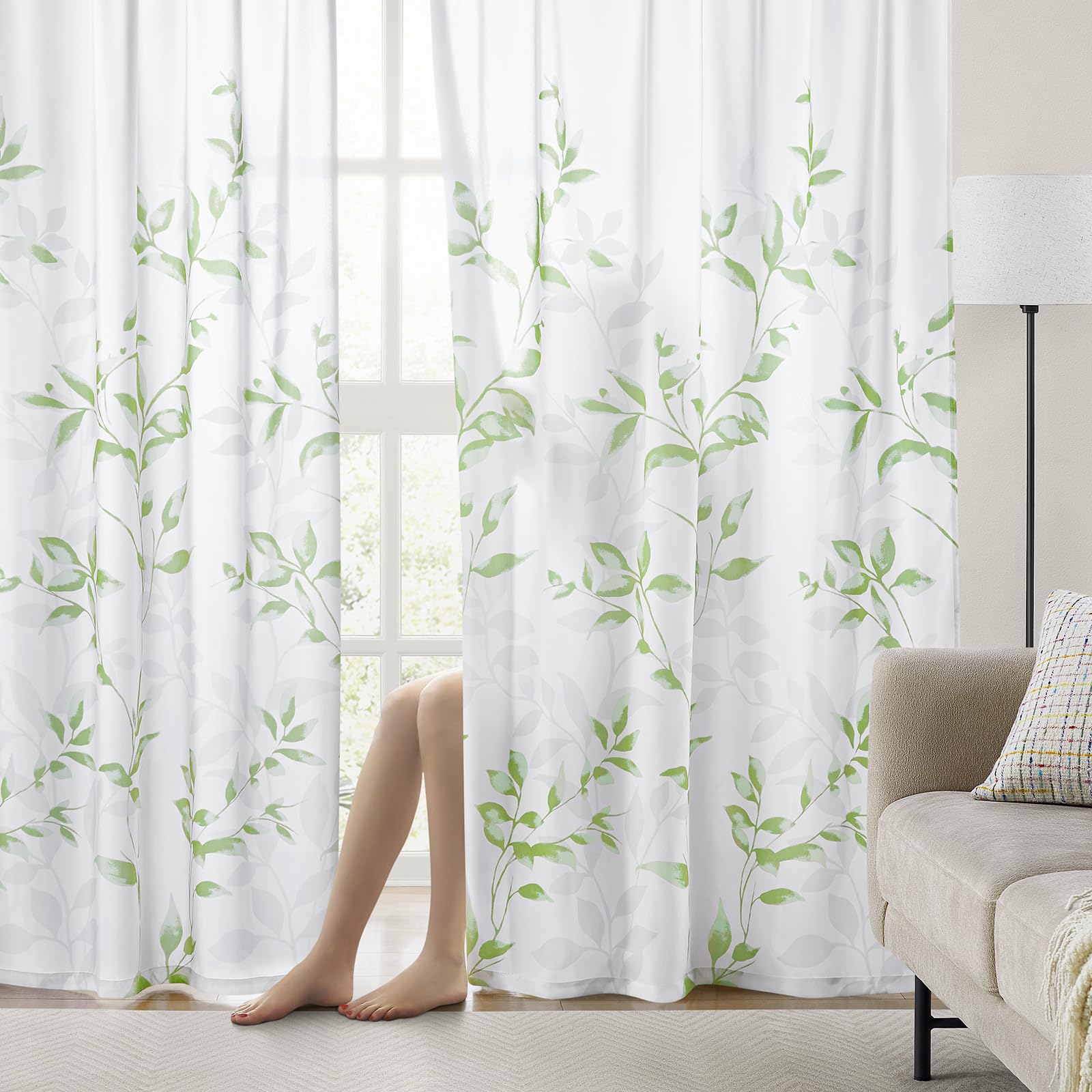 Homeideas sage-green semi-sheer curtain provides gentle light diffusion.