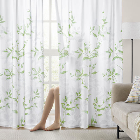 Homeideas sage-green semi-sheer curtain provides gentle light diffusion.