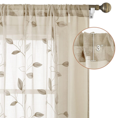 HOMEIDEAS taupe sheer curtains offer privacy while filtering daylight.