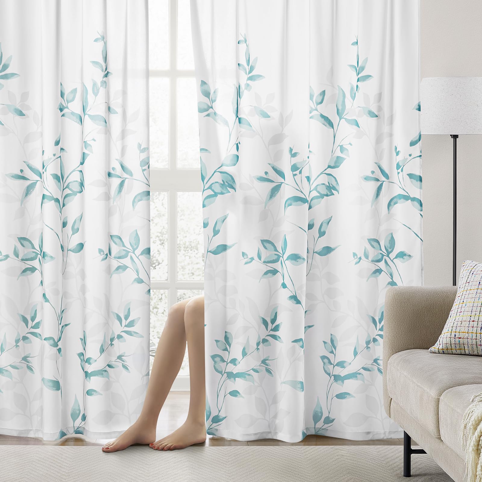 HOMEIDEAS teal and white sheer curtains installed in a bright room