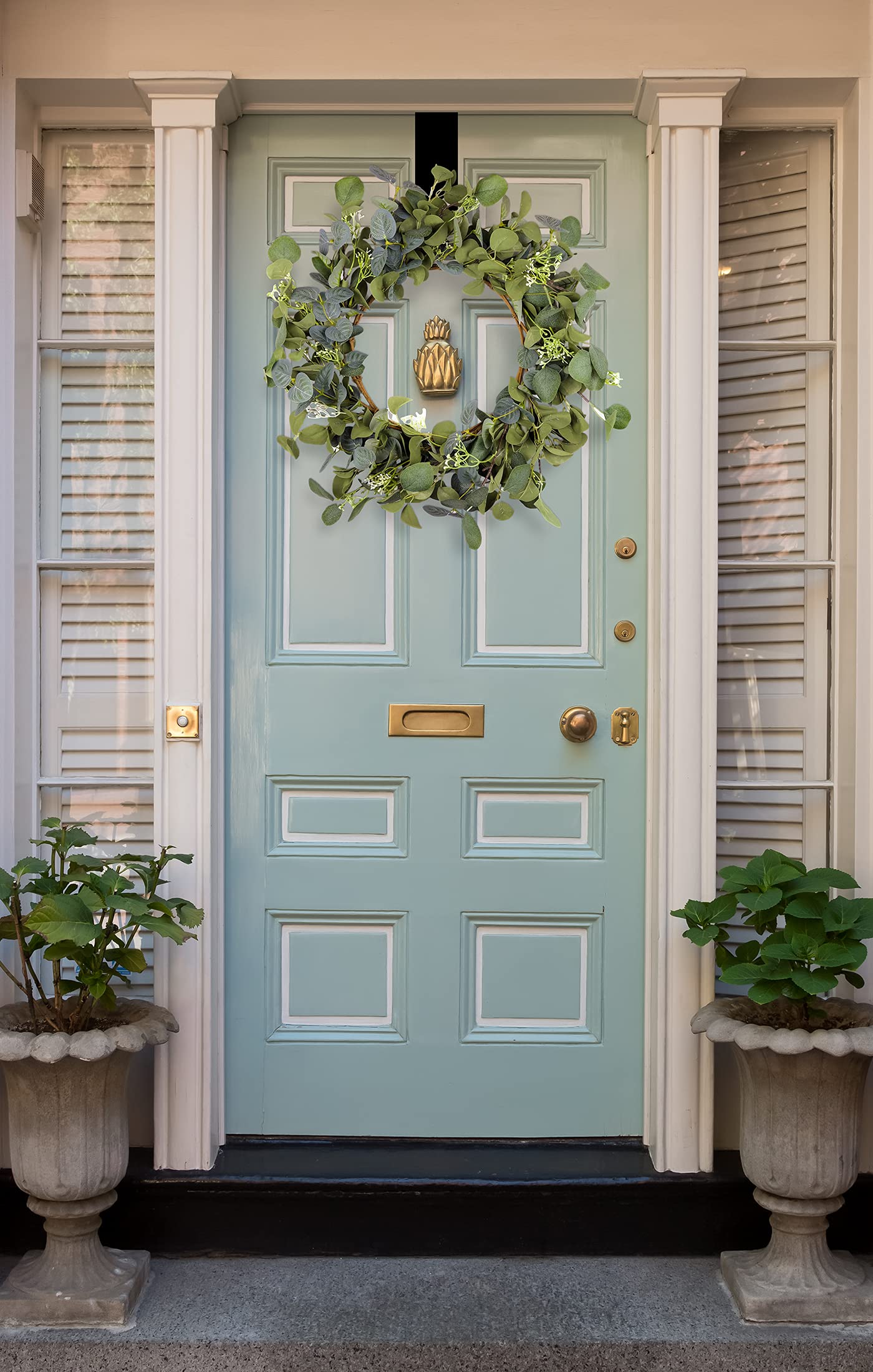 HomeKaren eucalyptus wreath durable base ensures lasting beauty year-round.