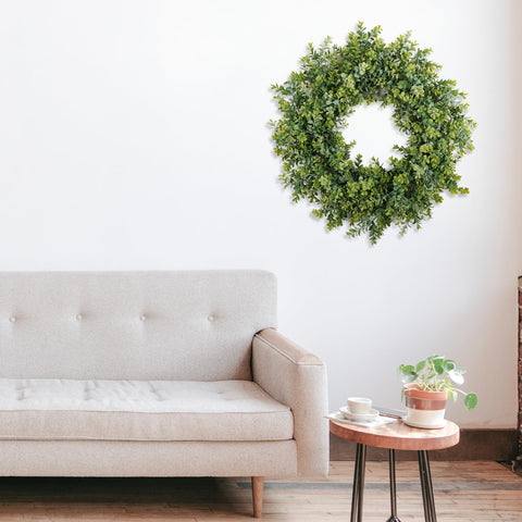 HomeKaren front door decoration welcomes guests with evergreen charm.