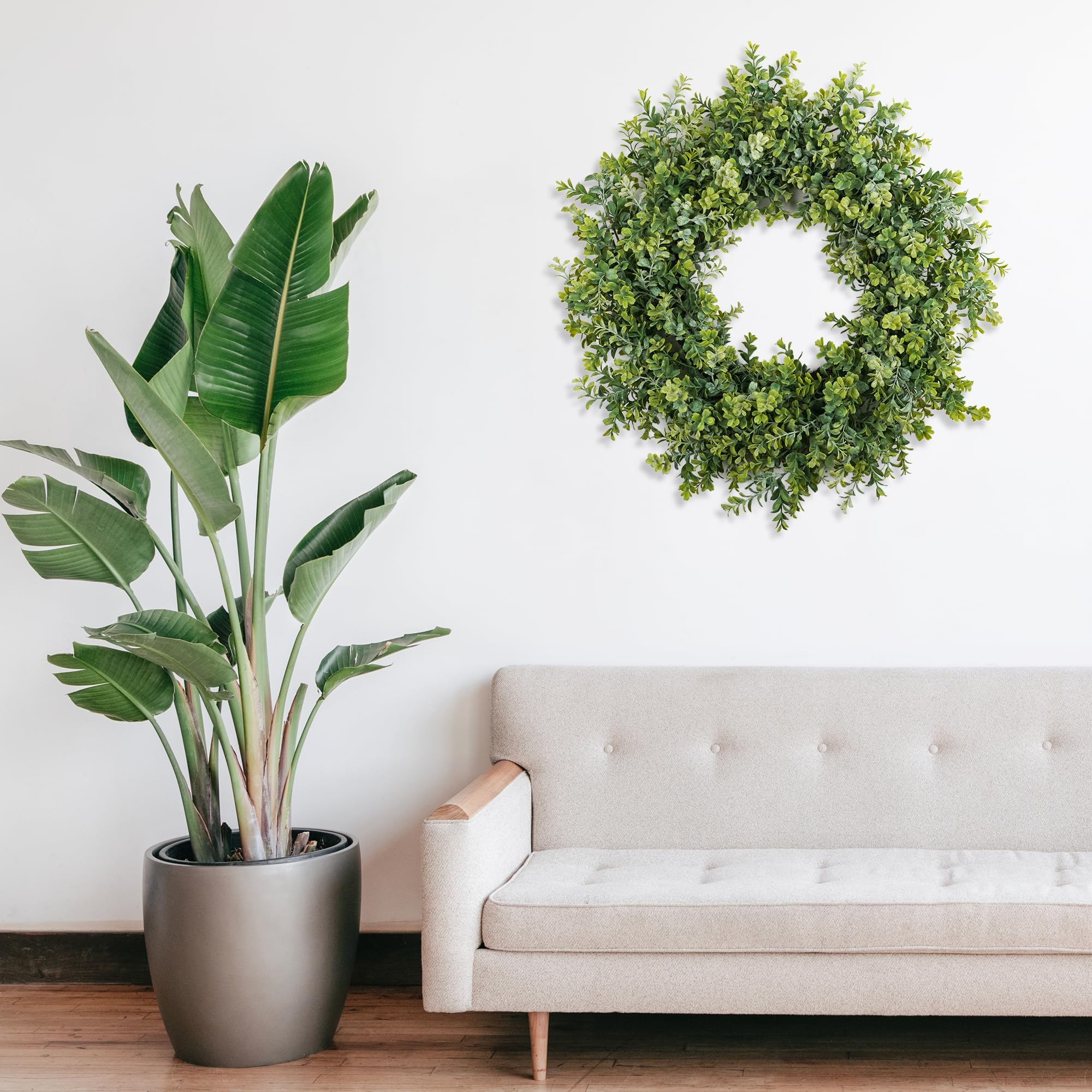 HomeKaren wreath window display invites natural light and seasonal vibes.