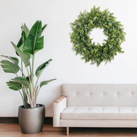 HomeKaren wreath window display invites natural light and seasonal vibes.