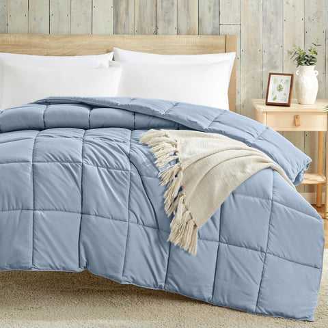 Homelike Moment all-season blue comforter offers adaptable warmth for year-round use.