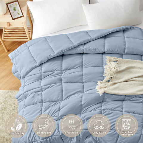 Homelike Moment blue comforter with quilted texture for cozy, breathable warmth.
