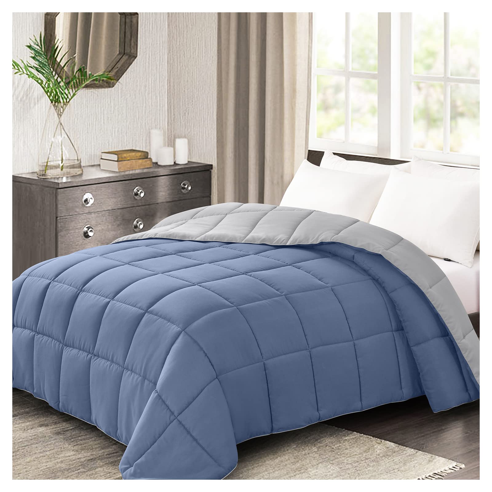 Homelike Moment blue reversible comforter on a queen bed for versatile styling.