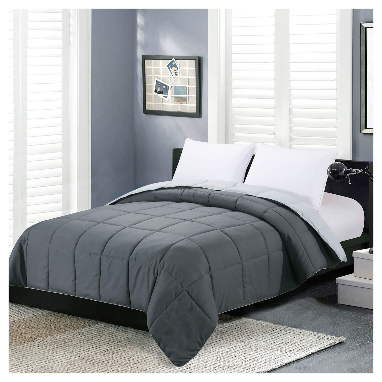 Homelike Moment reversible comforter displays dark and light grey sides for versatile styling options.
