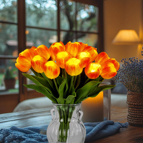 HOMESEASONS orange tulip bloom in vase enhances table centerpiece