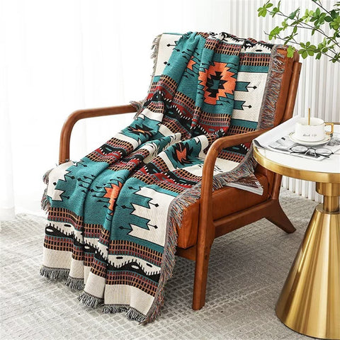 Homesy boho throw blanket with Southwestern print, cozy warmth for sofa or bed.