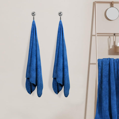 HOMEXCEL durable blue bath towel maintains plush feel wash after wash.