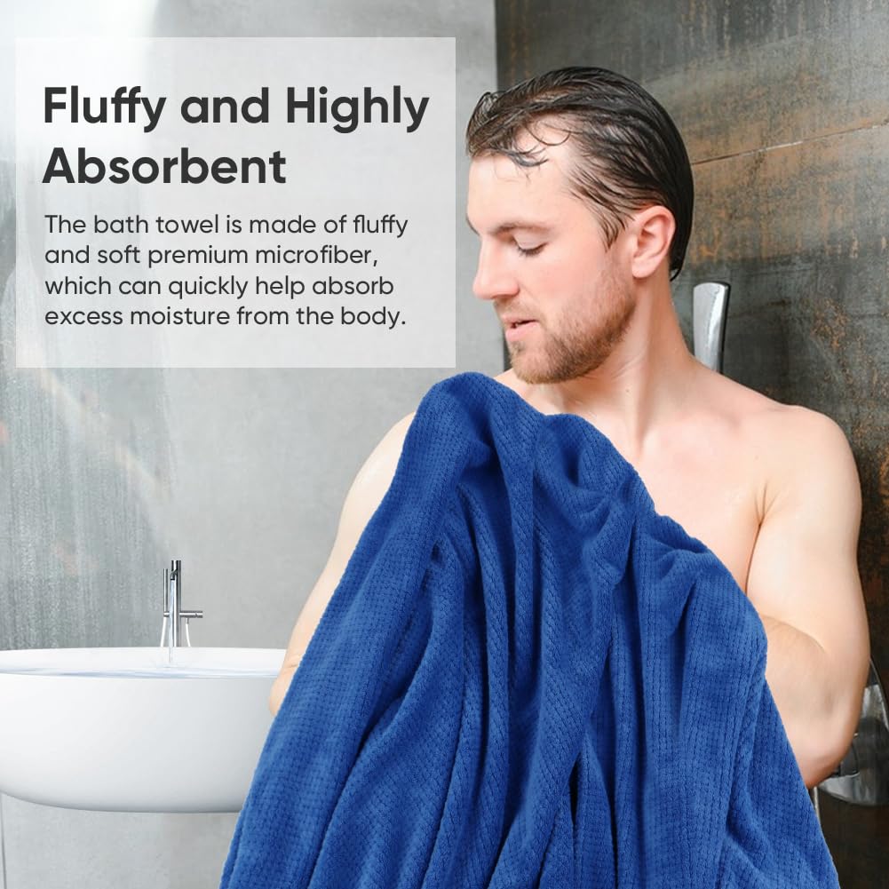 HOMEXCEL four-pack blue towels neatly stacked in a bathroom.