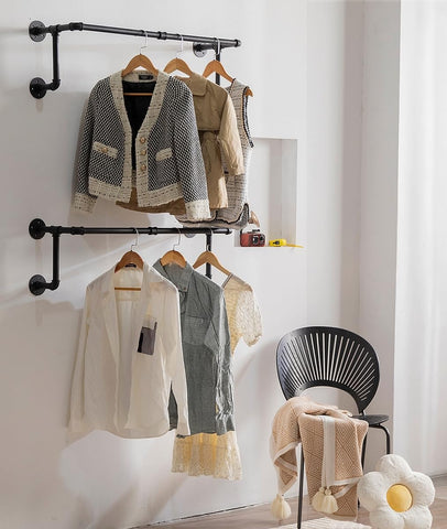 Homeyeeng industrial wall rack for hanging clothes adds a chic, space-saving storage solution.