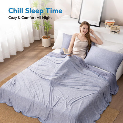 HOMFINE cooling blanket on bed at night highlights cooling performance.