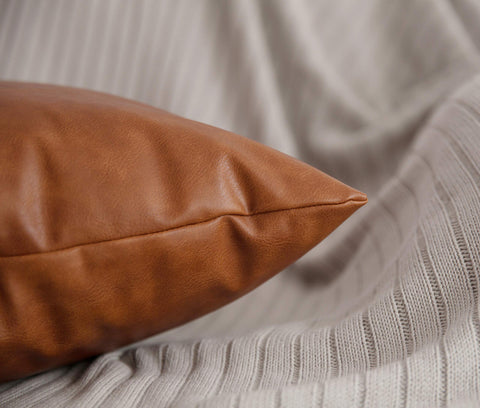 HOMFINER cognac pillow cover with invisible zipper for clean edges.