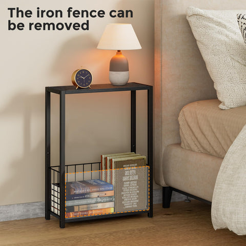 Homleke narrow side table used as nightstand beside bed for essentials.